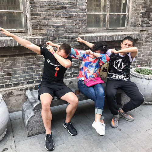 three people dabbing
