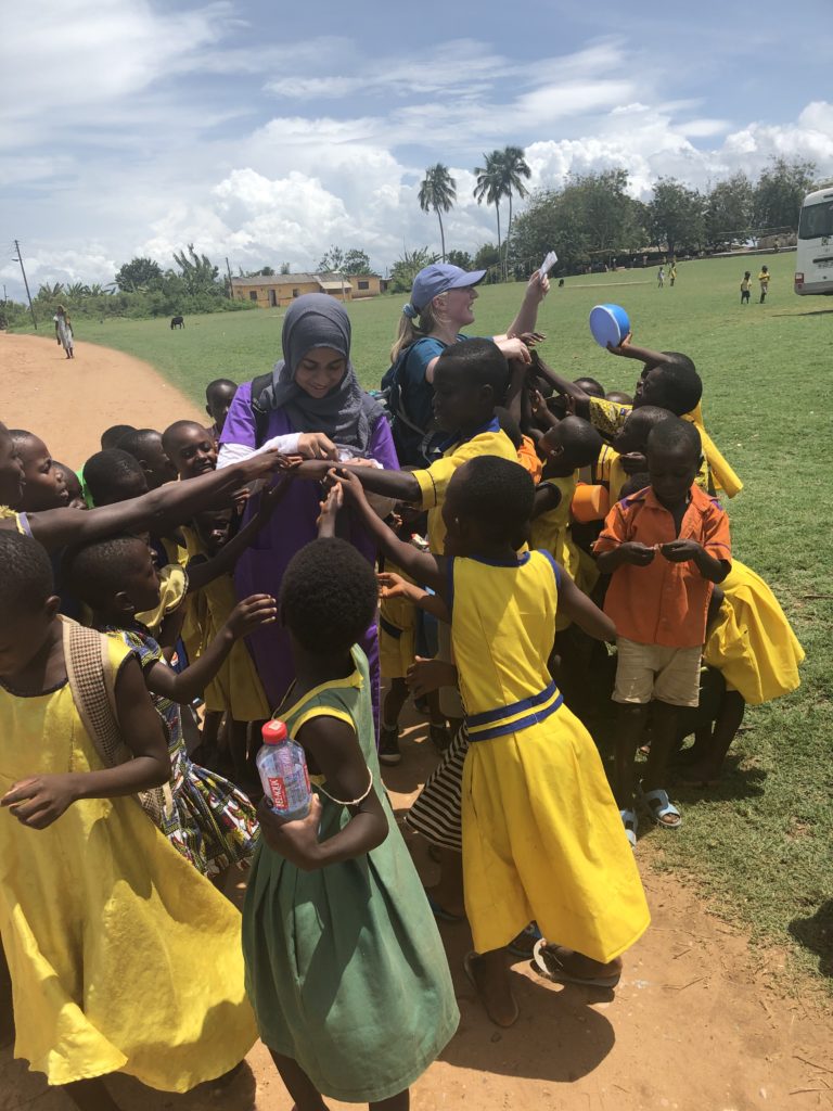 Mariam plays with a group of kids in Ghana