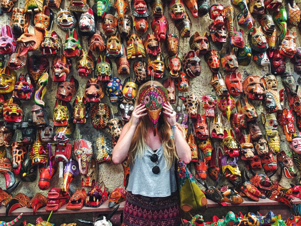 woman and colorful masks