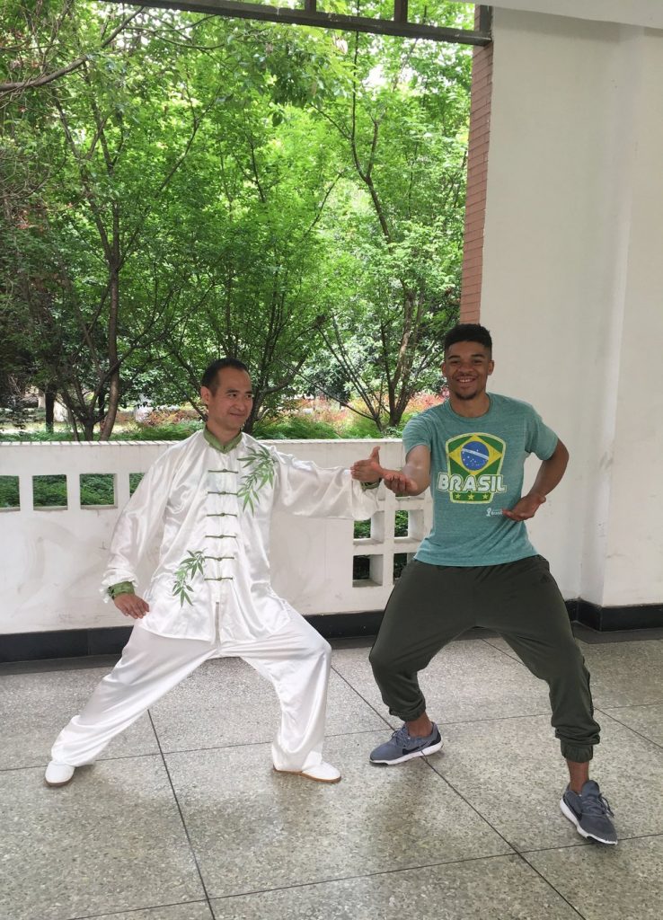 two men practicing martial arts