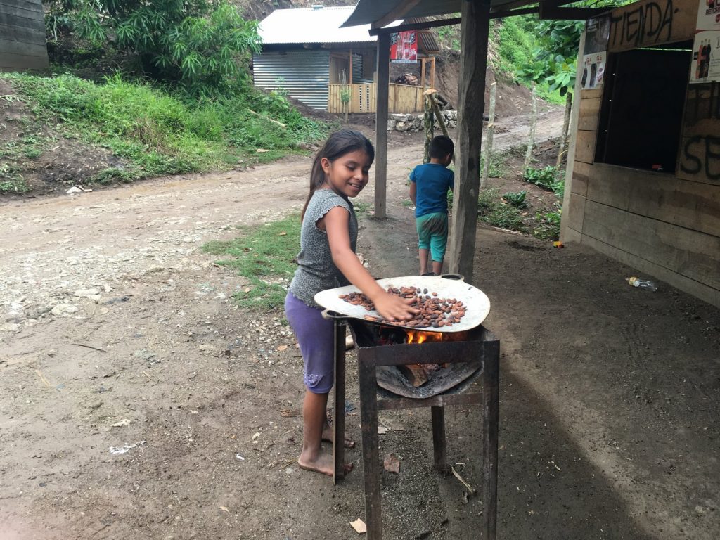 young person cooking outside