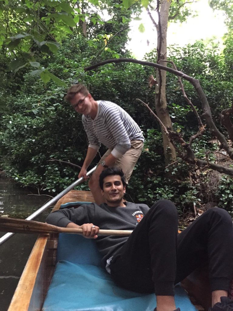 Sam riding a boat with a fiend